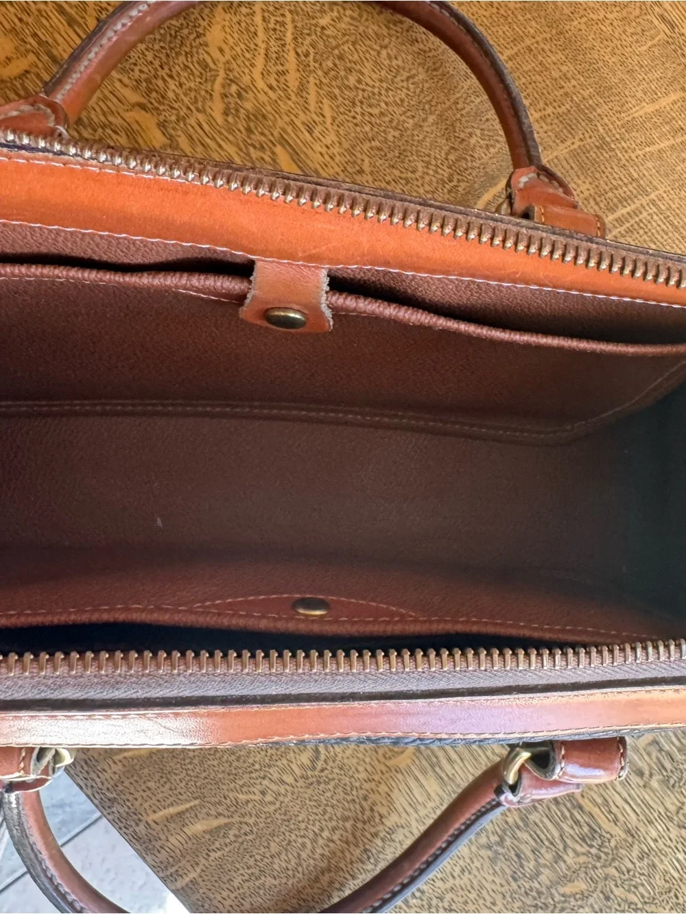 Dooney & Bourke Black and Brown Pebbled Leather Satchel